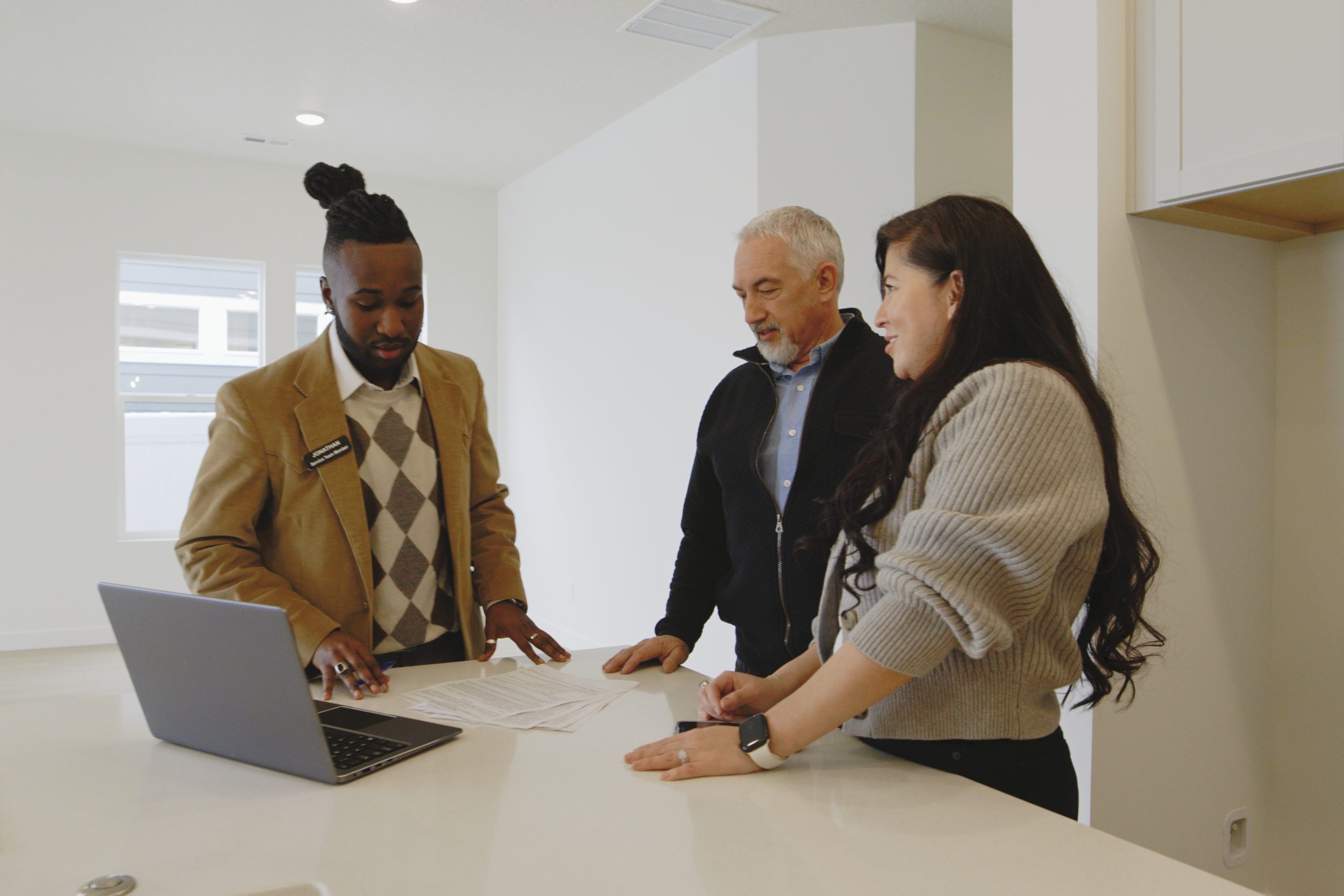 real estate agent talking to buyers