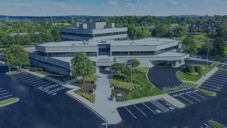 birds eye medical professional building view with parking spaces